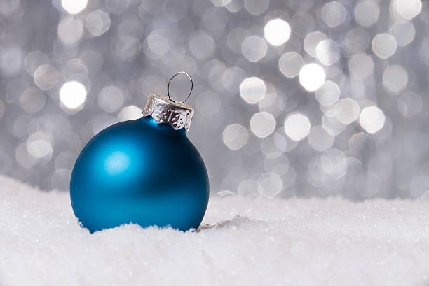 istock Festive Christmas Decoration on Snow with a shiny Background 500135054