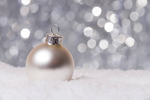 istock Festive Christmas Decoration on Snow with a shiny Background 500135156