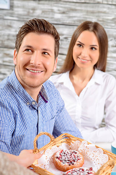 istock Happy friends sitting in the cafe 500135244