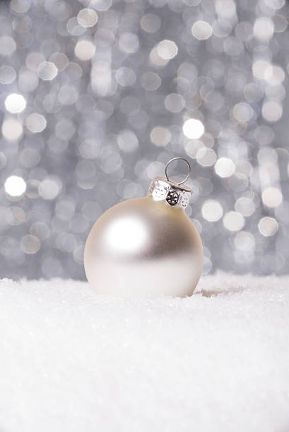 istock Festive Christmas Decoration on Snow with a shiny Background 500135504