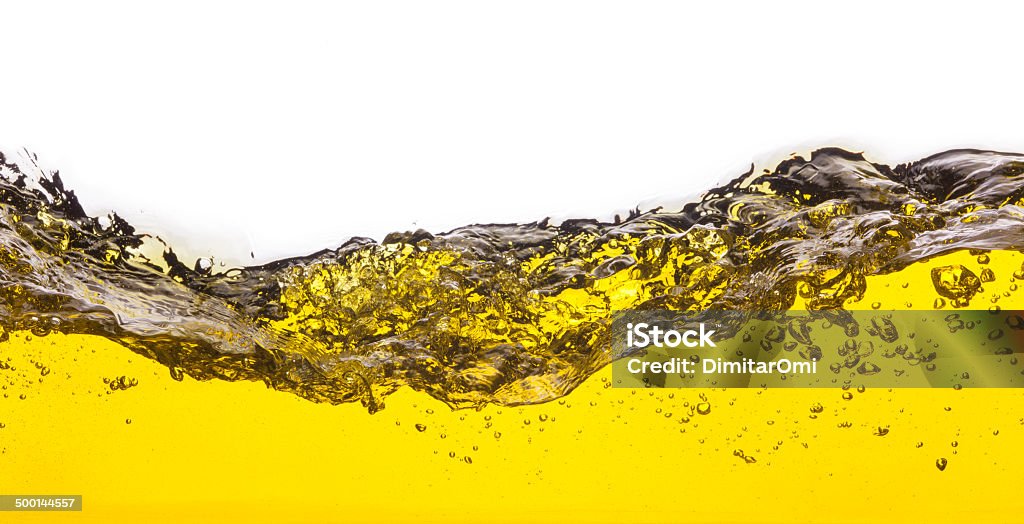 abstract image of a yellow liquid spilled. On a white background. An abstract image of spilled oil . On a white background. Abstract Stock Photo