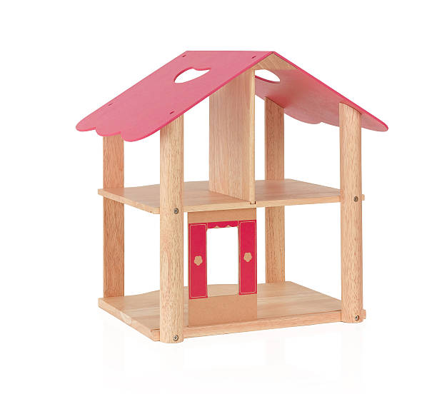 istock Wooden toy dollhouse isolated 500144609