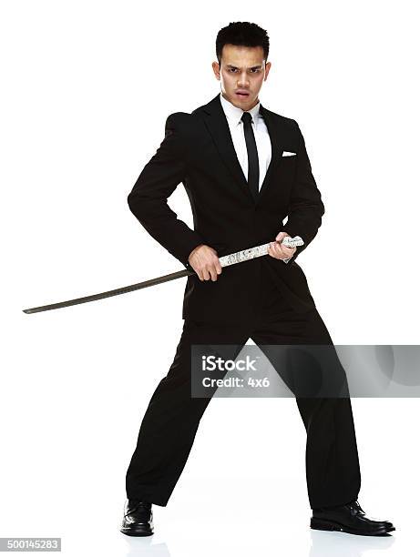 Businessman Standing With Sword Stock Photo - Download Image Now - 20-29 Years, Adult, Adults Only