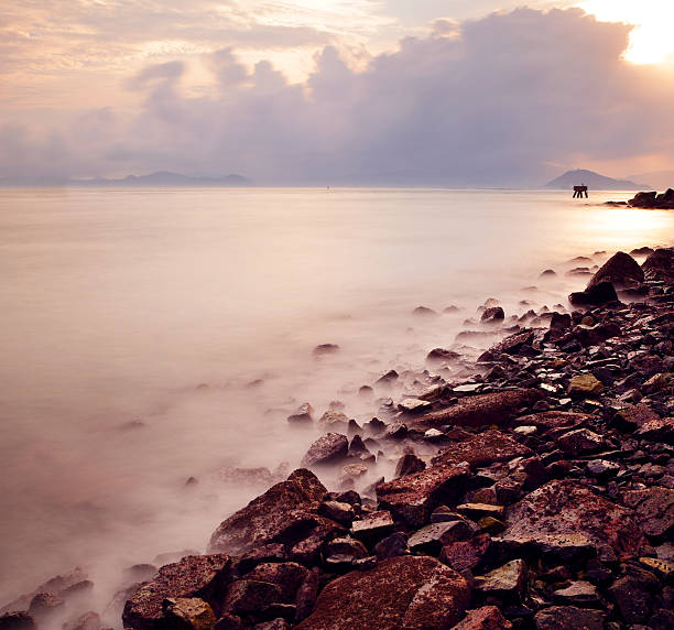 istock Sunset sea coast and stone 500145641