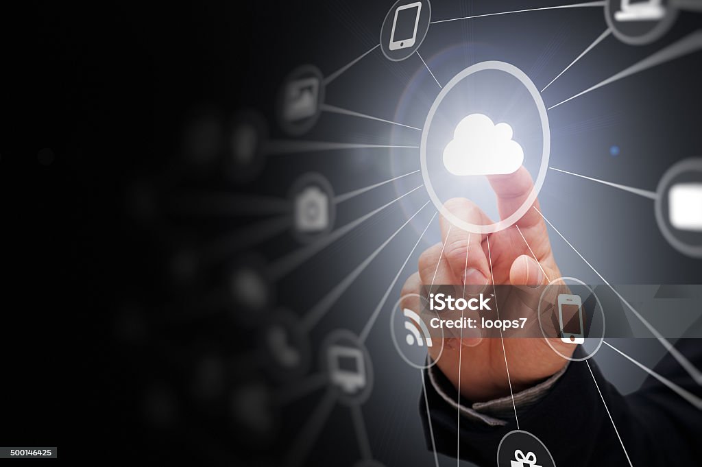 Technology Concept Man touching touch screen with cloud computing Cloud Computing Stock Photo