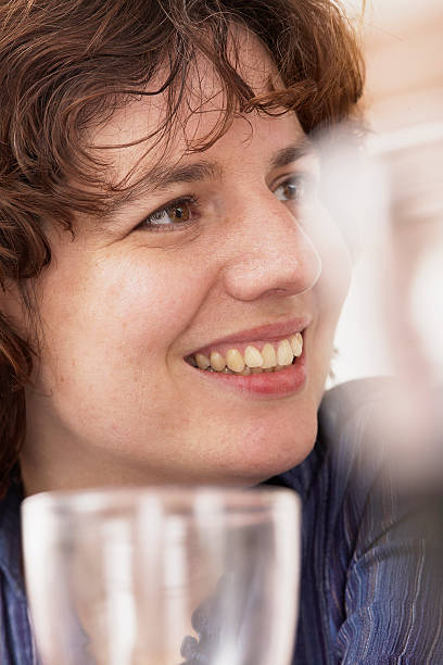 woman drinking with friends stock photo