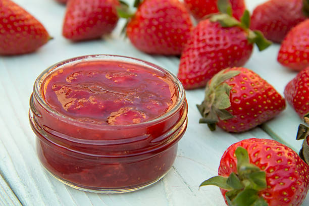 istock strawberry jam in the bank is on the table 500149193