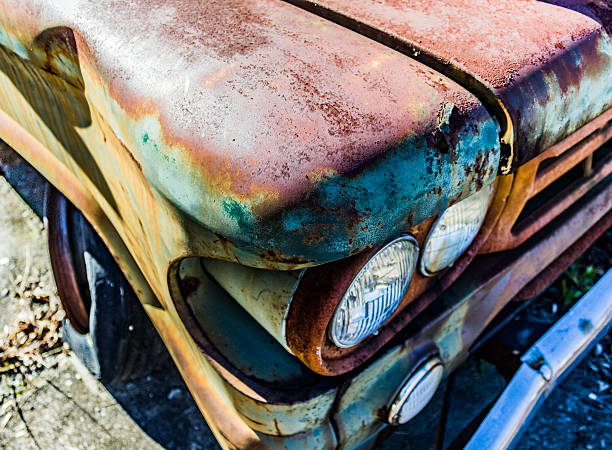 istock Rusty, old, junked car in the woods 500154548