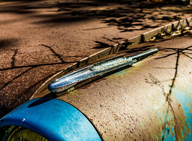 istock Rusty, old, junked car in the woods 500154674