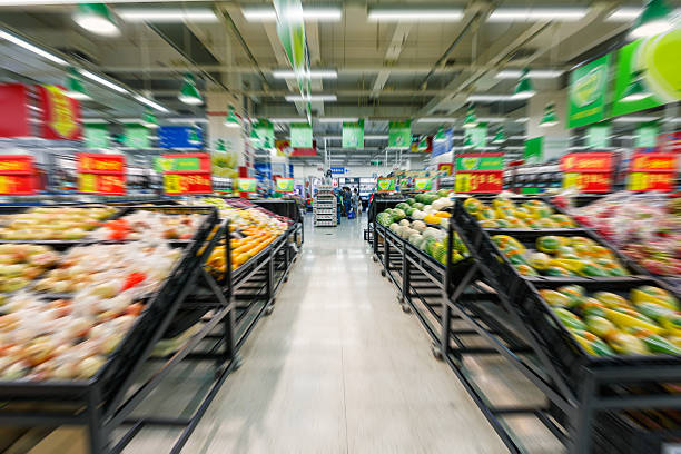 istock supermarket aisle Motion Blur background 500156212