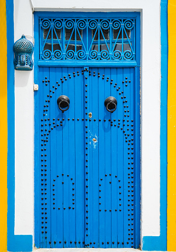 Traditional Blue door with ornament from Sidi Bou Said in Tunisia