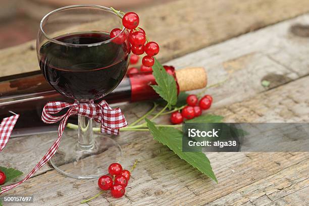 Red Currant Wine In Glass On Wooden Background Stock Photo - Download Image Now - Alcohol - Drink, Alcohol Abuse, Bottle