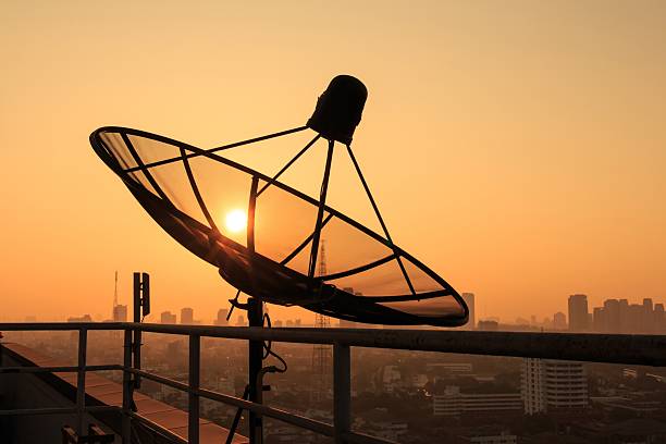 istock Satellite Dish on the Roof at Sunrise. 500160297
