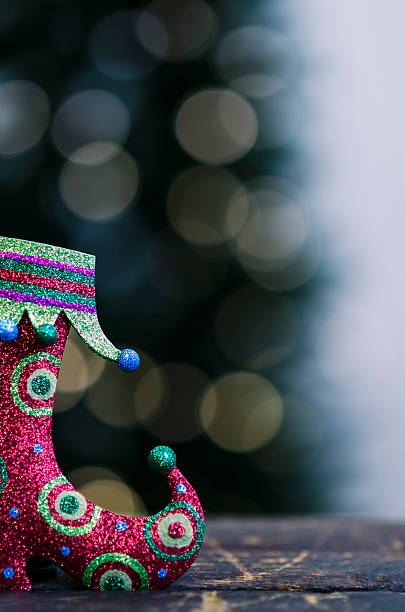 Red Christmas Stocking Ornament Green Bokeh Background stock photo