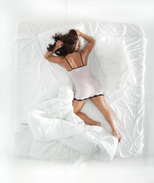 istock Above view of woman sleeping 500160977