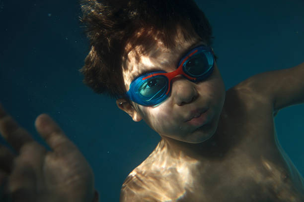 istock Child dipping in the pool. 500161559