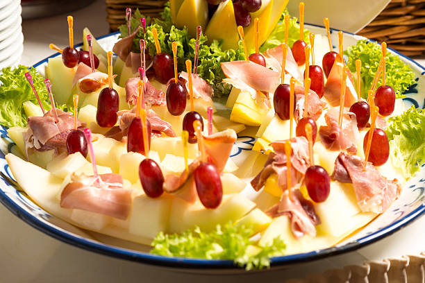 istock Pineapples with ham on tray at buffet in restaurant 500162819