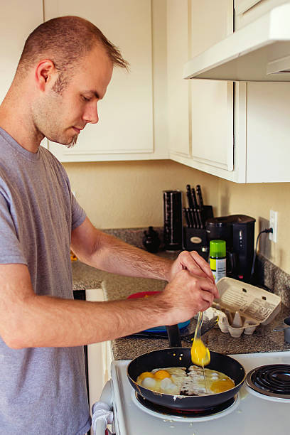 Cooking Eggs stock photo