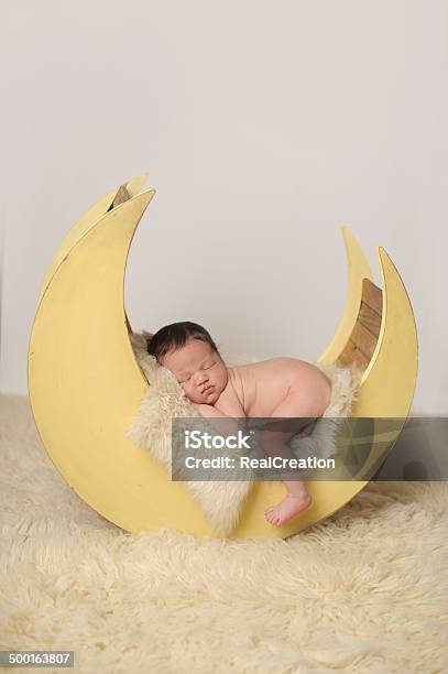 Newborn Boy Sleeping Peacefully On Moon Prop Stock Photo - Download Image Now - Baby - Human Age, Newborn, Yellow