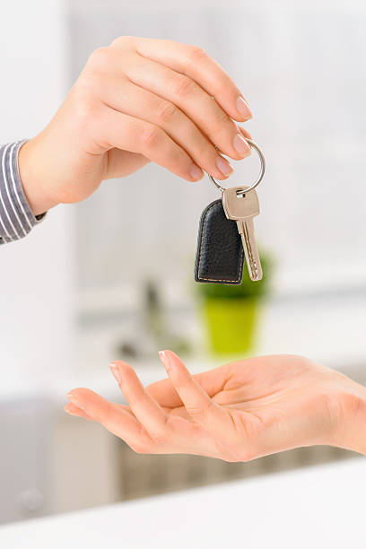 istock Hotel client receiving her room key 500169996