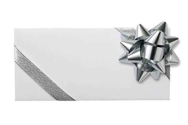 istock Isolated shot of blank envelope with bow on white background 500170356