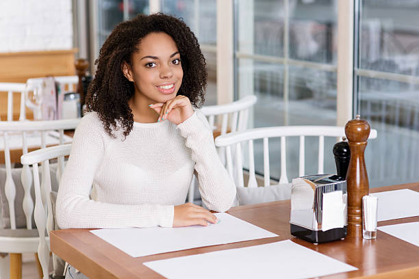istock Young lady sitting at the restaurant 500171140