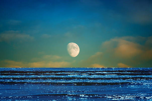 istock Seascape and lunar sky 500172573