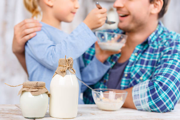 istock Positive father and daughter having breakfast 500173310
