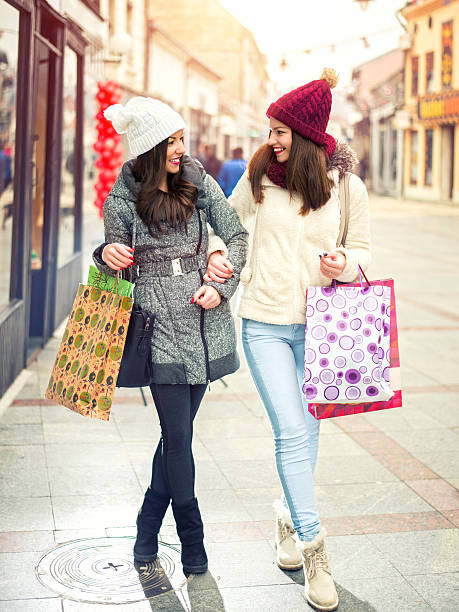 istock Two beautiful women in shopping 500173994
