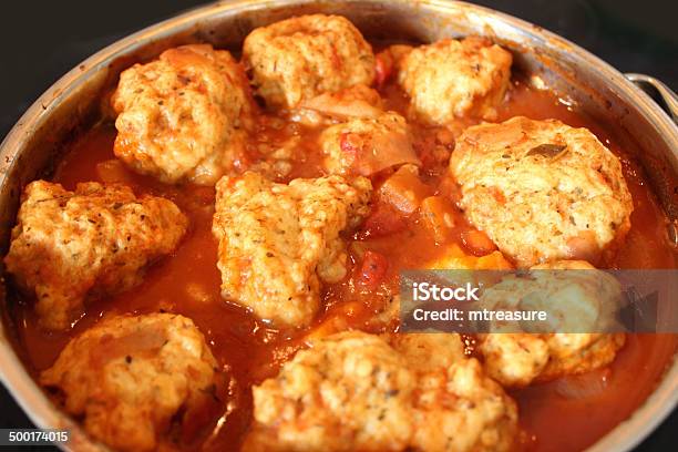 Image Of Homemade Chicken Casserole In Saucepan With Dumplings Floating Stock Photo - Download Image Now