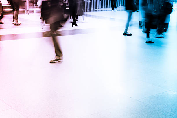 istock group of blur passengers, walking at subway station. 500175107