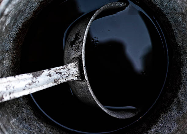 istock Old and rusty scoop in a bucket with water. 500175801