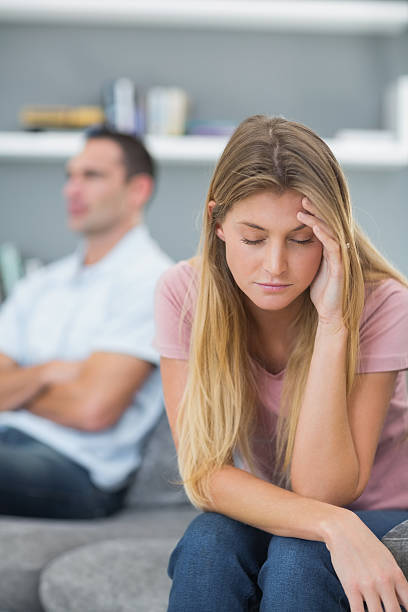 istock Couple not speaking after a fight on the couch 500176149