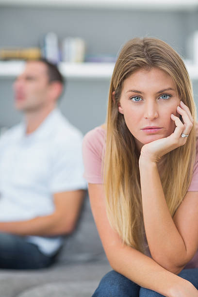 istock Couple not talking after a dispute on the couch 500176177