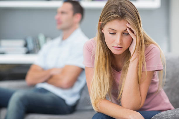 istock Couple not talking after a fight on the sofa 500176201