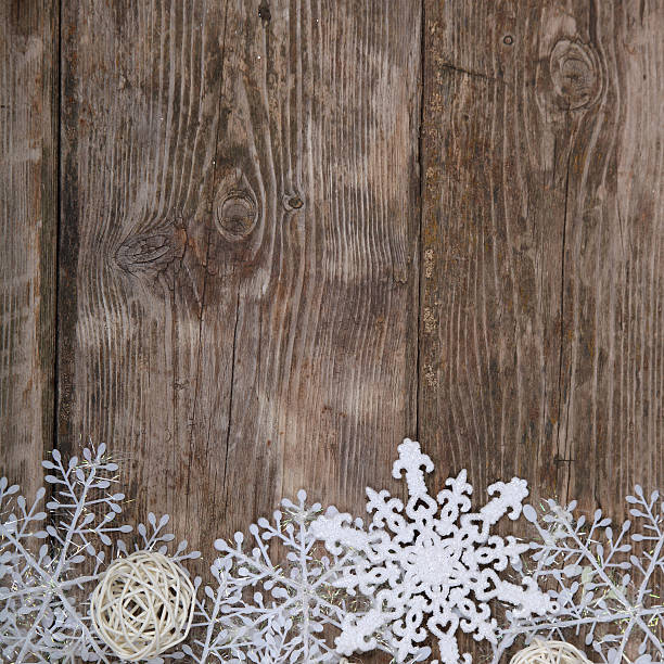 istock Christmas decorations on an old wooden table 500177168