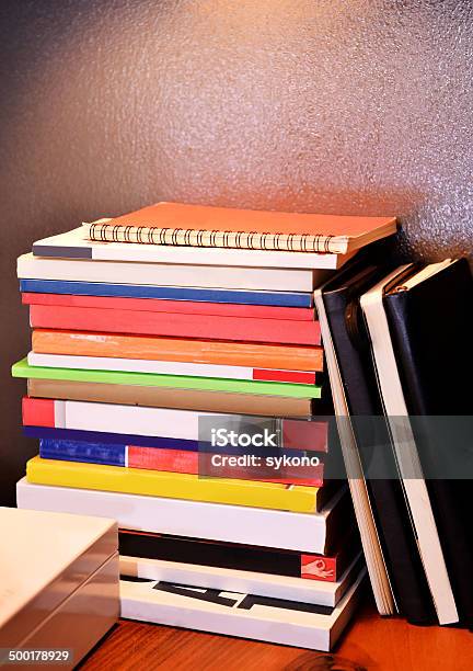 Books Near Wall Stock Photo - Download Image Now - Arrangement, Backgrounds, Book