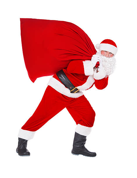 istock Santa Claus pull Christmas bag with presents isolated on white 500183142