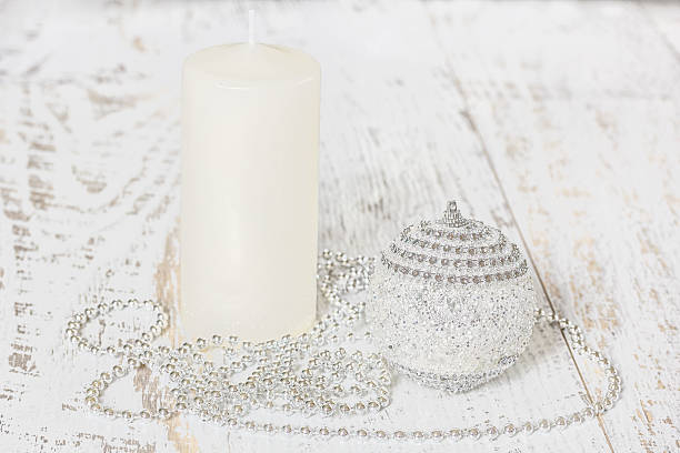 istock Christmas ball, candle, beads on wooden boards 500183632