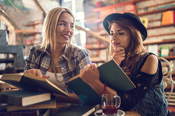 istock Young female friends preparing their exams in a library. 500184792