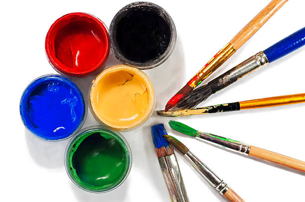 istock Paint buckets and paint brushes 500185124