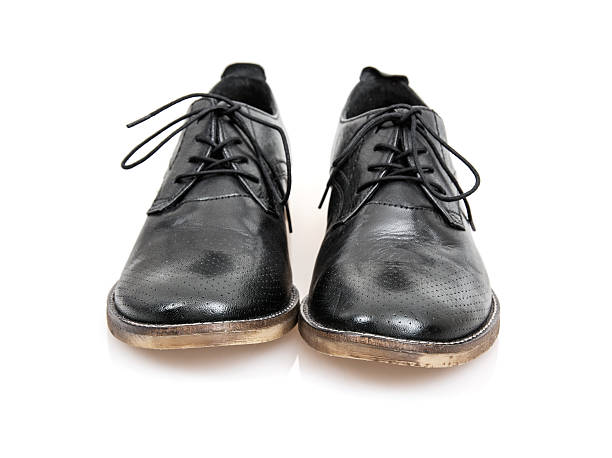 istock Pair of black leather shoes 500185850