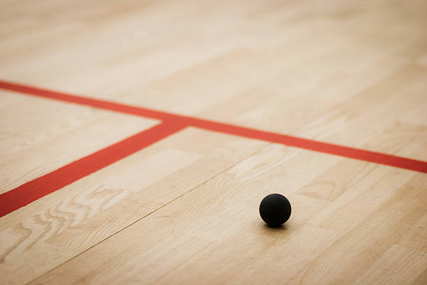 Squash ball Squash ball on the court squash sport stock pictures, royalty-free photos & images