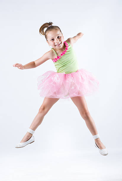 istock Young ballerina jumping and exercising 500199225
