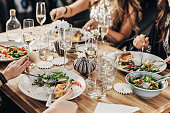 Mature women having dinner party