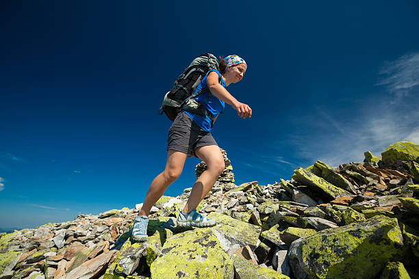 istock Hiker jumps over stones in Carpathian mountains 500203646