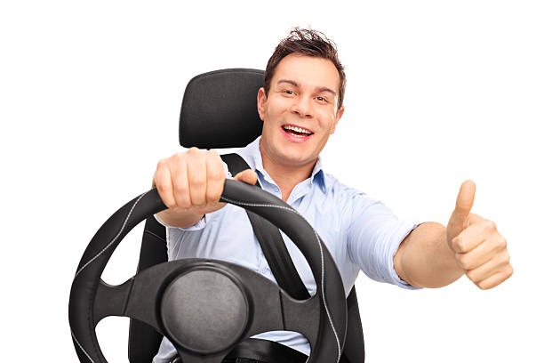 istock Joyful man driving and giving a thumb up 500204424