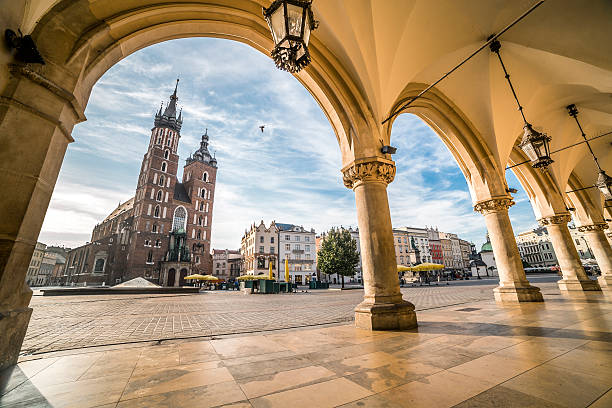 Krakow Market Square taken from Cloth Hall, Poland Cloth Halls and Mary's Church at Historic Krakow Market Square in the Morning, Poland krakow stock pictures, royalty-free photos & images