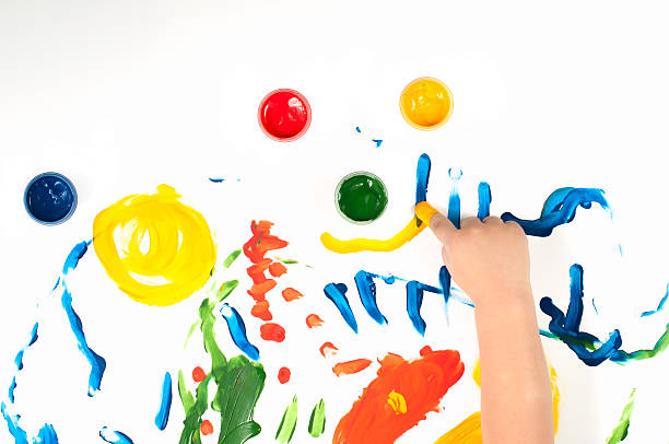 istock child draws ink on paper 500205374