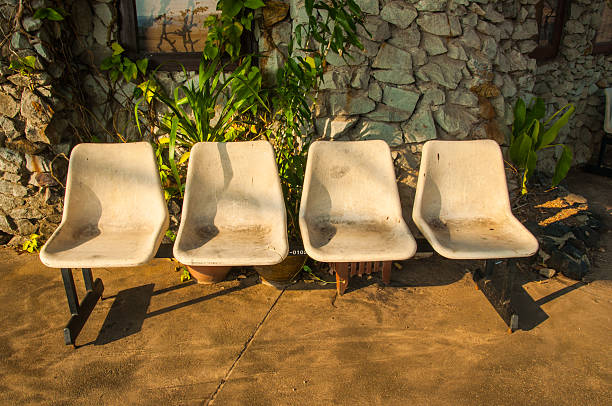 istock old chair with bricks and window wall 500212298
